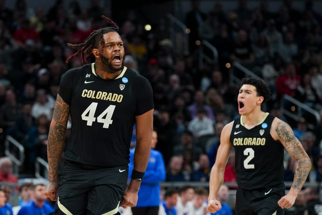 Colorado Buffaloes center Eddie Lampkin Jr. (44) and Colorado Buffaloes guard KJ Simpson (2) celebrate scoring a basket Friday, March 22, 2024, during the first round of the NCAA Men’s Basketball Tournament at Gainbridge Fieldhouse in Indianapolis. Florida Gators and Colorado Buffaloes are tied 45-45 at halftime.