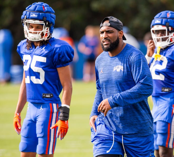 New Florida secondary coach Will Harris directs his defensive backs during the Florida Gators as they held their final open Spring football practice before the Orange and Blue Game at Sanders Practice Fields in Gainesville, FL on Tuesday, April 9, 2024. [Doug Engle/Gainesville Sun]