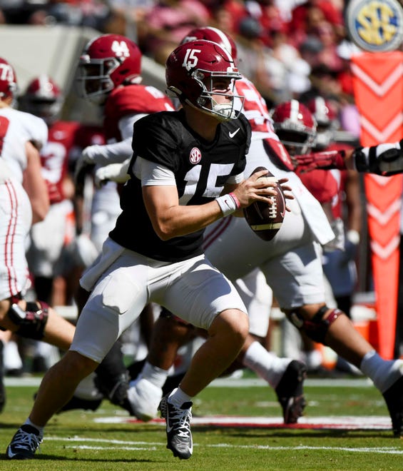 Apr 13, 2024; Tuscaloosa, AL, USA; Alabama quarterback Ty Simpson (15) rolls out during the A-Day scrimmage at Bryant-Denny Stadium. Mandatory Credit: Gary Cosby Jr.-USA TODAY Sports