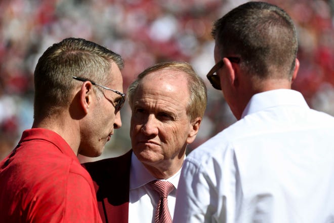 Apr 13, 2024; Tuscaloosa, AL, USA; University of Alabama President Stuart Bell, center, stands with basketball coach Nate Oats and athletics director Greg Byrne during the A-Day game at Bryant-Denny Stadium. Mandatory Credit: Gary Cosby Jr.-USA TODAY Sports