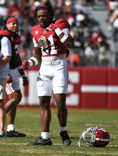 Apr 13, 2024; Tuscaloosa, AL, USA; Alabama defensive back Dre Kirkpatrick Jr. (21) wears some jewelry after intercepting a pass during the A-Day game at Bryant-Denny Stadium. Mandatory Credit: Gary Cosby Jr.-USA TODAY Sports