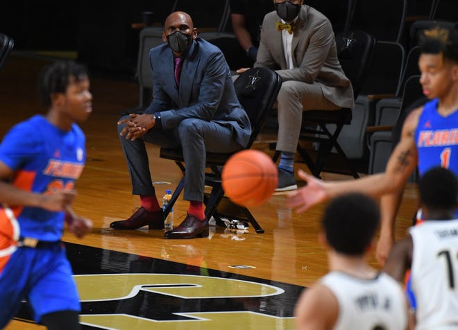 Dec 30, 2020; Nashville, Tennessee, USA; Vanderbilt Commodores head coach Jerry Stackhouse looks on from the sidelines during the second half against the Florida Gators at Memorial Gymnasium. Mandatory Credit: Christopher Hanewinckel-USA TODAY Sports