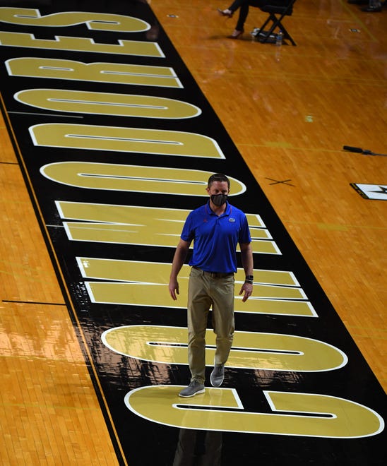 Dec 30, 2020; Nashville, Tennessee, USA; Florida Gators head coach Mike White walks the sidelines during the second half against the Vanderbilt Commodores at Memorial Gymnasium. Mandatory Credit: Christopher Hanewinckel-USA TODAY Sports