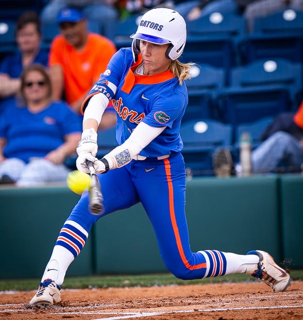 Florida infielder Skylar Wallace (17) hits the ball in the bottom of the first. The Florida women’s softball team hosted Stetson at Katie Seashole Pressly Stadium in Gainesville, FL on Wednesday, March 29, 2023. Florida won 8-0 in six. [Doug Engle/Gainesville Sun]