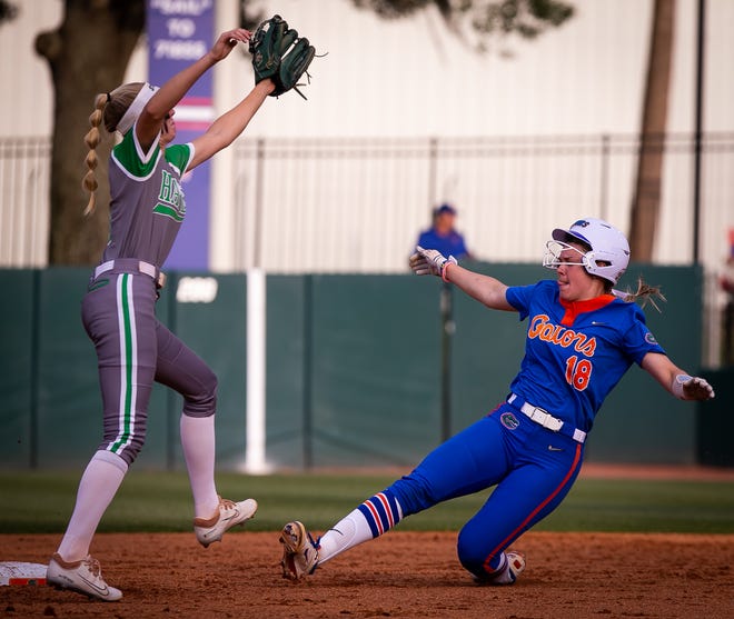 Florida utility Emily Wilkie (18) steals second safely in the bottom of the second. The Florida women’s softball team hosted Stetson at Katie Seashole Pressly Stadium in Gainesville, FL on Wednesday, March 29, 2023. Florida won 8-0 in six. [Doug Engle/Gainesville Sun]