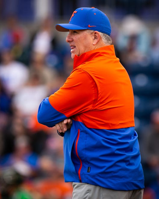 Florida Head Softball Coach Tim Walton coaches from the sidelines. The Florida women’s softball team hosted Stetson at Katie Seashole Pressly Stadium in Gainesville, FL on Wednesday, March 29, 2023. Florida won 8-0 in six. [Doug Engle/Gainesville Sun]