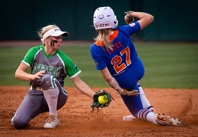 Florida outfielder Kendra Falby (27) steals second in the bottom of the fourth as Stetson Kami Eppley (4) gets the ball late. The Florida women’s softball team hosted Stetson at Katie Seashole Pressly Stadium in Gainesville, FL on Wednesday, March 29, 2023. Florida won 8-0 in six. [Doug Engle/Gainesville Sun]