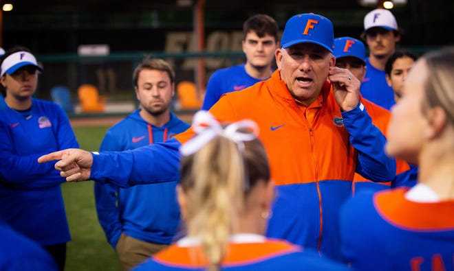 Florida Head Softball Coach Tim Walton talks with his team after the game Wednesday. The Florida women’s softball team hosted Stetson at Katie Seashole Pressly Stadium in Gainesville, FL on Wednesday, March 29, 2023. Florida won 8-0 in six. [Doug Engle/Gainesville Sun]