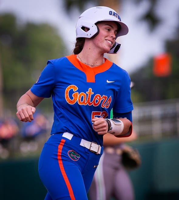 Florida utility Sarah Longley (52) rounds third after hitting a solo home run in the bottom of the second to make it 3-0 Florida. The Florida women’s softball team hosted Stetson at Katie Seashole Pressly Stadium in Gainesville, FL on Wednesday, March 29, 2023. Florida won 8-0 in six. [Doug Engle/Gainesville Sun]