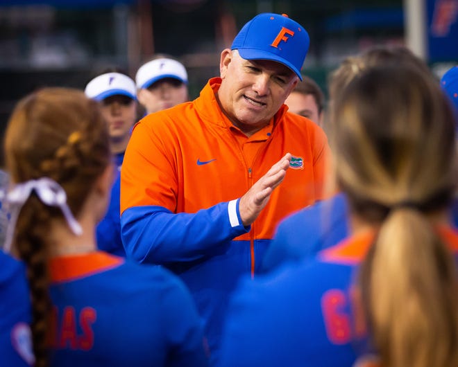 Florida Head Softball Coach Tim Walton talks with his team after the game Wednesday. The Florida women’s softball team hosted Stetson at Katie Seashole Pressly Stadium in Gainesville, FL on Wednesday, March 29, 2023. Florida won 8-0 in six. [Doug Engle/Gainesville Sun]