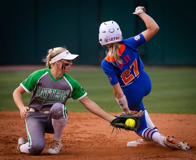 Florida outfielder Kendra Falby (27) steals second in the bottom of the fourth as Stetson Kami Eppley (4) gets the ball late. The Florida women’s softball team hosted Stetson at Katie Seashole Pressly Stadium in Gainesville, FL on Wednesday, March 29, 2023. Florida won 8-0 in six. [Doug Engle/Gainesville Sun]