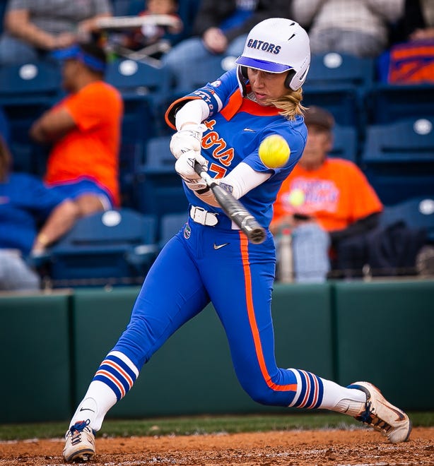 Florida infielder Skylar Wallace (17) hits the ball in the bottom of the second. The Florida women’s softball team hosted Stetson at Katie Seashole Pressly Stadium in Gainesville, FL on Wednesday, March 29, 2023. Florida won 8-0 in six. [Doug Engle/Gainesville Sun]