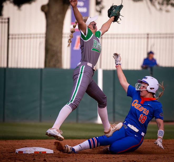 Florida utility Emily Wilkie (18) steals second safely in the bottom of the second. The Florida women’s softball team hosted Stetson at Katie Seashole Pressly Stadium in Gainesville, FL on Wednesday, March 29, 2023. Florida won 8-0 in six. [Doug Engle/Gainesville Sun]