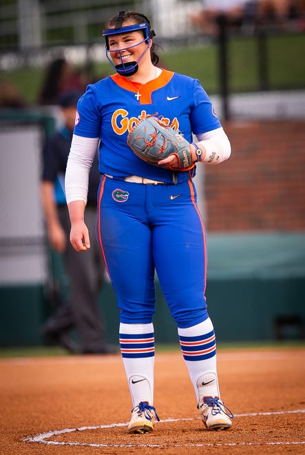 Florida starting pitcher/relief pitcher Lexie Delbrey (16) was all smiles at the start of the game. The Florida women’s softball team hosted Stetson at Katie Seashole Pressly Stadium in Gainesville, FL on Wednesday, March 29, 2023. Florida won 8-0 in six. [Doug Engle/Gainesville Sun]