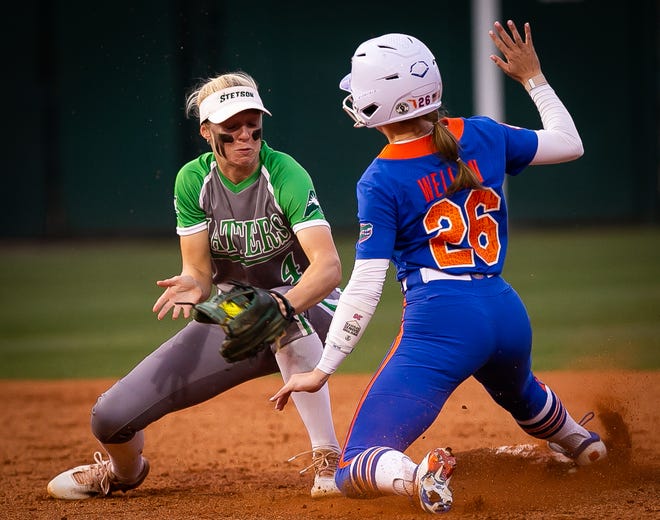 Florida outfielder Christina Wellen (26) steals second in the bottom of the 6th as Stetson Kami Eppley (4) gets the ball late. The Florida women’s softball team hosted Stetson at Katie Seashole Pressly Stadium in Gainesville, FL on Wednesday, March 29, 2023. Florida won 8-0 in six. [Doug Engle/Gainesville Sun]
