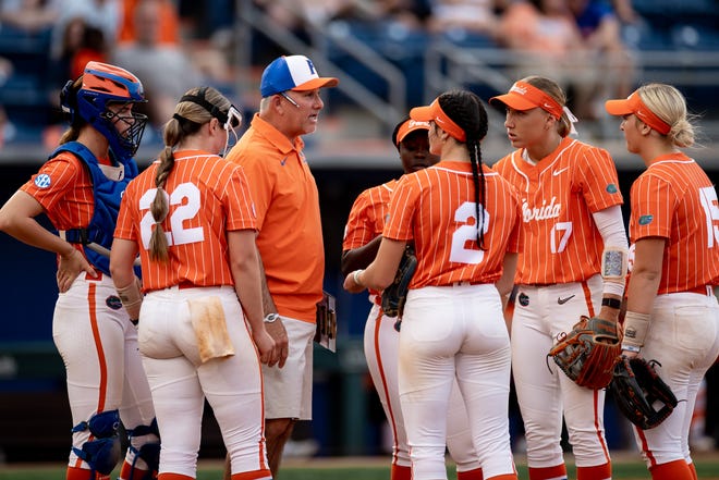 Florida Gators head coach Tim Walton talks with his team during a timeout during the game against the Auburn Tigers at Katie Seashole Pressly Stadium at the University of Florida in Gainesville, FL on Thursday, April 6, 2023. [Matt Pendleton/Gainesville Sun]