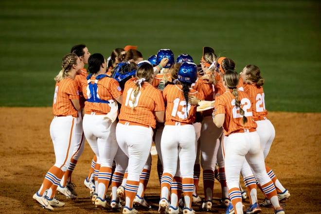 The Florida Gators team celebrates after a win after the game against the Auburn Tigers at Katie Seashole Pressly Stadium at the University of Florida in Gainesville, FL on Thursday, April 6, 2023. [Matt Pendleton/Gainesville Sun]