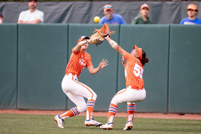 Florida Gators outfielder Katie Kistler (29) and Florida Gators utility Pal Egan (55) both attempt to catch a fly ball during the game against the Auburn Tigers at Katie Seashole Pressly Stadium at the University of Florida in Gainesville, FL on Thursday, April 6, 2023. [Matt Pendleton/Gainesville Sun]