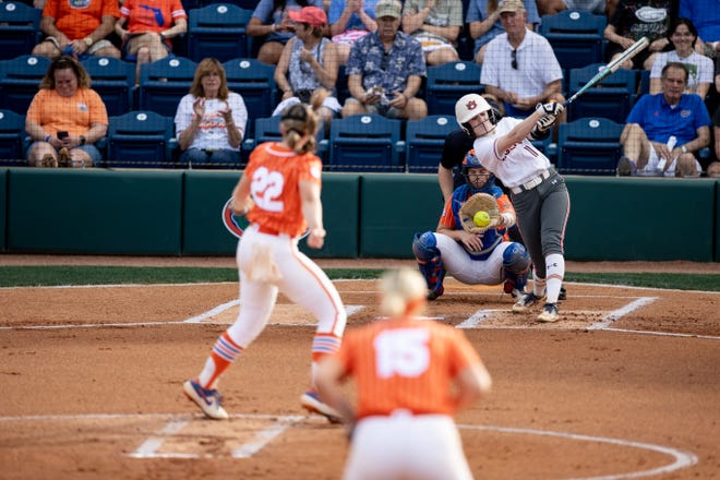 Florida Gators pitcher Elizabeth Hightower (22) pitches to Auburn Tigers catcher Aubrie Lisenby (11) during the game at Katie Seashole Pressly Stadium at the University of Florida in Gainesville, FL on Thursday, April 6, 2023. [Matt Pendleton/Gainesville Sun]