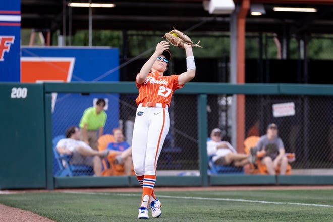 Florida Gators outfielder Kendra Falby (27) makes a catch for an out during the game against the Auburn Tigers at Katie Seashole Pressly Stadium at the University of Florida in Gainesville, FL on Thursday, April 6, 2023. [Matt Pendleton/Gainesville Sun]