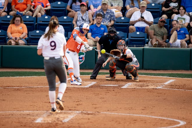 Auburn Tigers pitcher Maddie Penta (9) pitches to Florida Gators infielder Skylar Wallace (17) during the game at Katie Seashole Pressly Stadium at the University of Florida in Gainesville, FL on Thursday, April 6, 2023. [Matt Pendleton/Gainesville Sun]