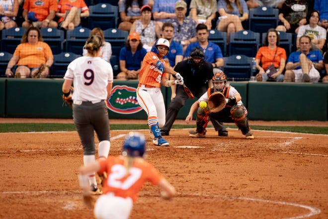 Florida Gators utility Pal Egan (55) attempts to hits the ball during the game against the Auburn Tigers at Katie Seashole Pressly Stadium at the University of Florida in Gainesville, FL on Thursday, April 6, 2023. [Matt Pendleton/Gainesville Sun]