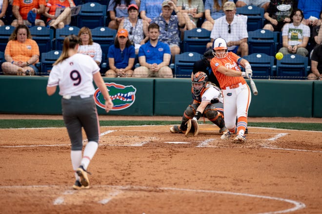 Auburn Tigers pitcher Maddie Penta (9) pitches ball to Florida Gators infielder Reagan Walsh (15) during the game at Katie Seashole Pressly Stadium at the University of Florida in Gainesville, FL on Thursday, April 6, 2023. [Matt Pendleton/Gainesville Sun]