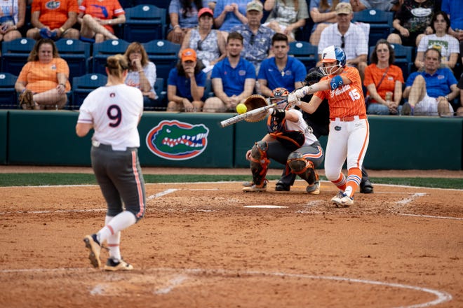 Florida Gators infielder Reagan Walsh (15) attempts to hits the ball during the game against the Auburn Tigers at Katie Seashole Pressly Stadium at the University of Florida in Gainesville, FL on Thursday, April 6, 2023. [Matt Pendleton/Gainesville Sun]
