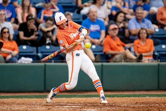 Florida Gators utility Sarah Longley (52) attempts to hit the ball during the game against the Auburn Tigers at Katie Seashole Pressly Stadium at the University of Florida in Gainesville, FL on Thursday, April 6, 2023. [Matt Pendleton/Gainesville Sun]