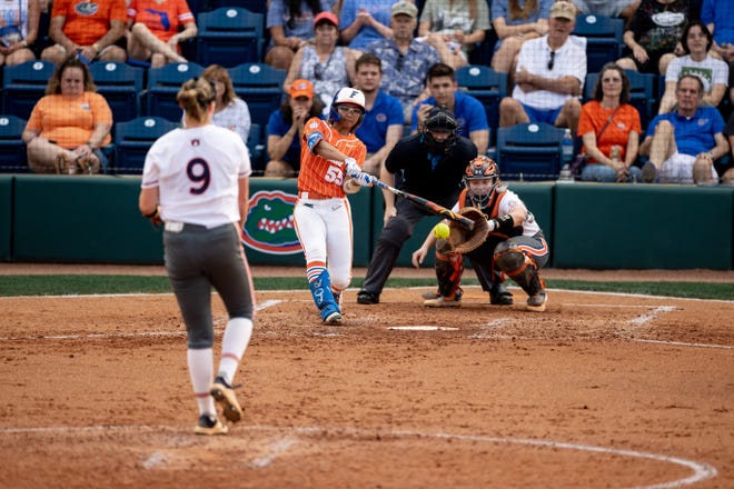Florida Gators utility Pal Egan (55) attempts to hits the ball during the game against the Auburn Tigers at Katie Seashole Pressly Stadium at the University of Florida in Gainesville, FL on Thursday, April 6, 2023. [Matt Pendleton/Gainesville Sun]