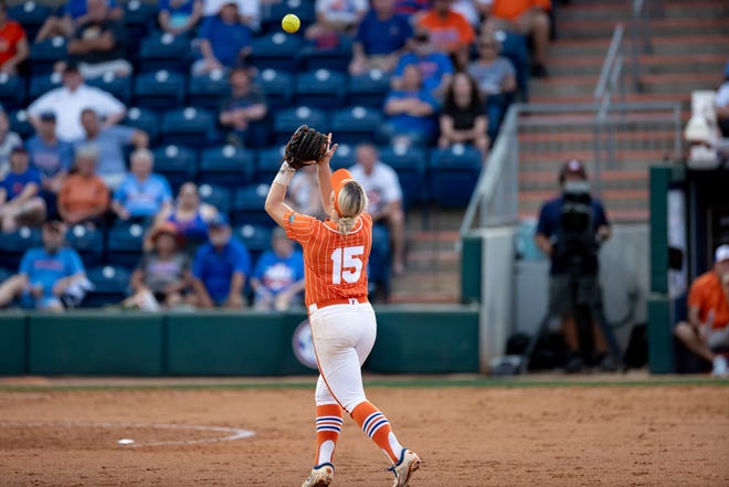 Florida Gators infielder Reagan Walsh (15) catches a fly ball during the game against the Auburn Tigers at Katie Seashole Pressly Stadium at the University of Florida in Gainesville, FL on Thursday, April 6, 2023. [Matt Pendleton/Gainesville Sun]