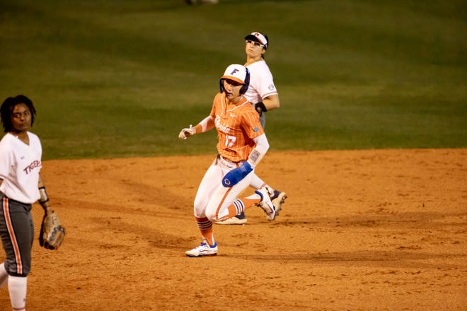 Florida Gators infielder Skylar Wallace (17) steals third base after a bad pitch during the game against the Auburn Tigers at Katie Seashole Pressly Stadium at the University of Florida in Gainesville, FL on Thursday, April 6, 2023. [Matt Pendleton/Gainesville Sun]