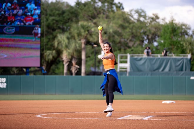Florida Gators softball alum Francesca Enea throws out the first pitch before the game against the Auburn Tigers at Katie Seashole Pressly Stadium at the University of Florida in Gainesville, FL on Thursday, April 6, 2023. [Matt Pendleton/Gainesville Sun]