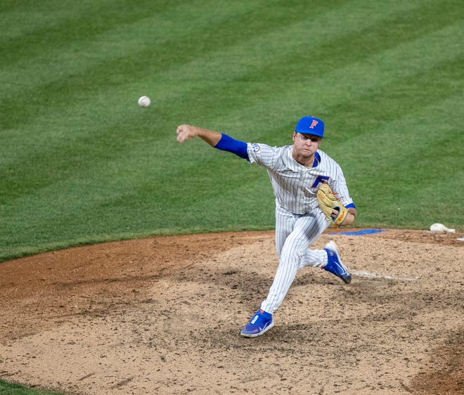 Florida's pitcher Brandon Neely (22) is the closer against Florida State University, Tuesday, April 11, 2023, at Condron Family Baseball Park in Gainesville, Florida. The Gators beat the Seminoles 5-3. [Cyndi Chambers/ Gainesville Sun] 2023
