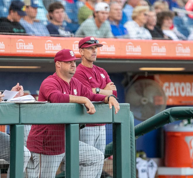 Florida StateÕs head coach Link Jarrett watches from the dugout in the game against Florida, Tuesday, April 11, 2023, at Condron Family Baseball Park in Gainesville, Florida. The Gators beat the Seminoles 5-3. [Cyndi Chambers/ Gainesville Sun] 2023