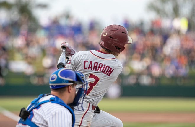 Florida State's infielder Jordan Carrion (3) with a single in the top of the sixth against Florida, Tuesday, April 11, 2023, at Condron Family Baseball Park in Gainesville, Florida. The Gators beat the Seminoles 5-3. [Cyndi Chambers/ Gainesville Sun] 2023