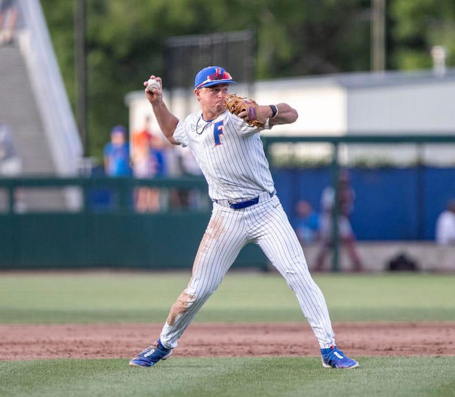 Florida's infielder Colby Halter (5) with the throw to first for the out in the top of the sixth against Florida State University, Tuesday, April 11, 2023, at Condron Family Baseball Park in Gainesville, Florida. The Gators beat the Seminoles 5-3. [Cyndi Chambers/ Gainesville Sun] 2023