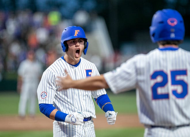 Florida's outfielder Ty Evans (2) with the three run homer in the bottom of the eighth against Florida State University, Tuesday, April 11, 2023, at Condron Family Baseball Park in Gainesville, Florida. The Gators beat the Seminoles 5-3. [Cyndi Chambers/ Gainesville Sun] 2023