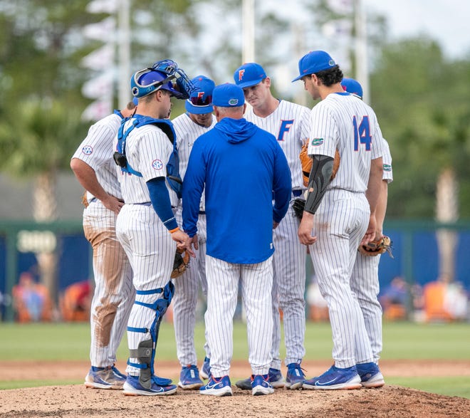 Florida head coach Kevin OÓ Sullivan with a mound visit during the game against Florida State, Tuesday, April 11, 2023, at Condron Family Baseball Park in Gainesville, Florida. The Gators beat the Seminoles 5-3. [Cyndi Chambers/ Gainesville Sun] 2023