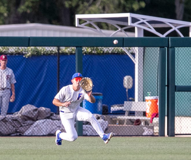 Florida's utility Wyatt Langford (36) with the sliding catch against FSU, Tuesday, April 11, 2023, at Condron Family Baseball Park in Gainesville, Florida. The Gators beat the Seminoles 5-3. [Cyndi Chambers/ Gainesville Sun] 2023