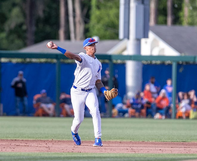 Florida's infielder Josh Rivera (24) with he throw to first for the out in the top of the fifth inning against FSU, Tuesday, April 11, 2023, at Condron Family Baseball Park in Gainesville, Florida. The Gators beat the Seminoles 5-3. [Cyndi Chambers/ Gainesville Sun] 2023