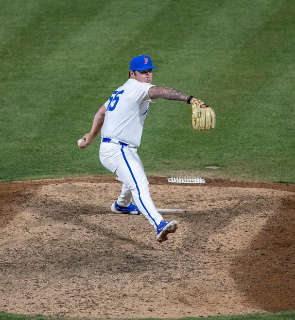 Florida's pitcher Philip Abner (55) pitches in relief in the top of the eighth inning against Georgia, Friday, April 14, 2023, at Condron Family Baseball Park in Gainesville, Florida. The Gators lost Game 1 of the weekend series to the Bulldogs 13-11. [Cyndi Chambers/ Gainesville Sun] 2023