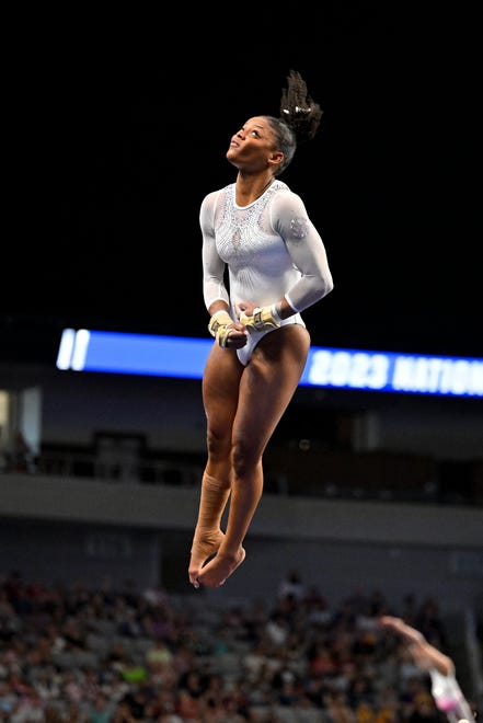 Apr 15, 2023; Fort Worth, TX, USA; University of Florida Gators gymnast Trinity Thomas earns a perfect score on vault during the NCAA Women's National Gymnastics Tournament Championship at Dickies Arena. Mandatory Credit: Jerome Miron-USA TODAY Sports