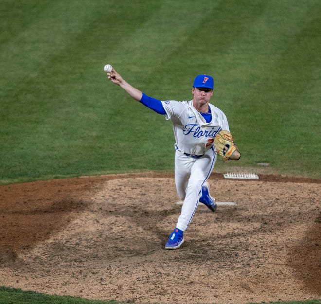 Florida's pitcher Brandon Neely (22) pitches in relief  against Georgia, Friday, April 14, 2023, at Condron Family Baseball Park in Gainesville, Florida. The Gators lost Game 1 of the weekend series to the Bulldogs 13-11. [Cyndi Chambers/ Gainesville Sun] 2023