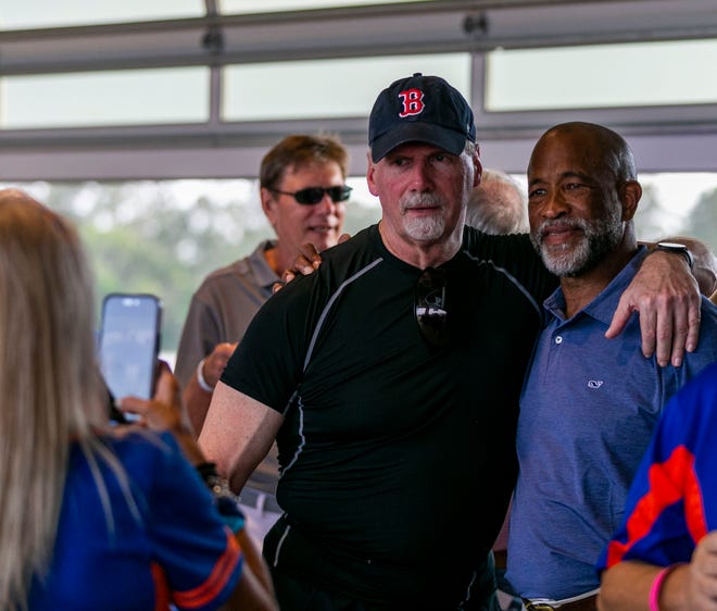 Former Gator baseball players Tony Stevens (left) and Jim Watkins (right) joined other former players from the 1970Õs  teams for a reunion during the Florida vs Georgia series, Saturday, April 15, 2023, at Condron Family Baseball Park in Gainesville, Florida. [Cyndi Chambers/ Gainesville Sun] 2023