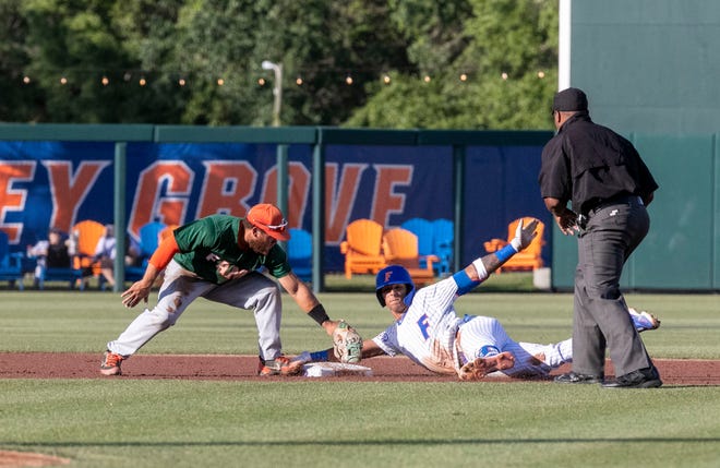 Florida's infielder Josh Rivera (24) steals second in the bottom of the first inning against Florida A&M. Florida beat FAMU17-7 in 7 innings of play, Tuesday, April 18, 2023, at Condron Family Baseball Park in Gainesville, Florida.[Cyndi Chambers/ Gainesville Sun] 2023