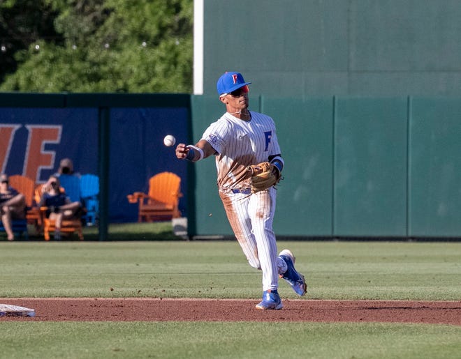 Florida's infielder Josh Rivera (24) with the throw to first for the out in the top of the second inning against Florida A&M. Florida beat FAMU17-7 in 7 innings of play, Tuesday, April 18, 2023, at Condron Family Baseball Park in Gainesville, Florida.[Cyndi Chambers/ Gainesville Sun] 2023