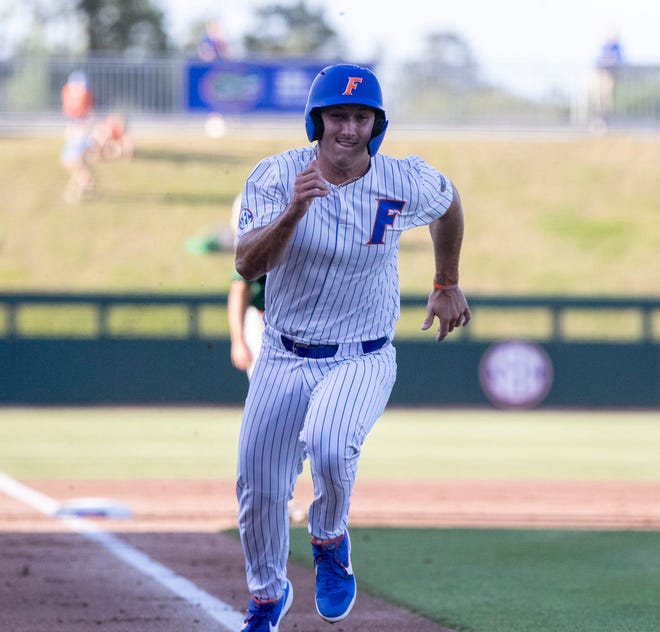 Florida's utility Wyatt Langford (36) scores a run in the bottom of the first inning against Florida A&M. Florida beat FAMU17-7 in 7 innings of play, Tuesday, April 18, 2023, at Condron Family Baseball Park in Gainesville, Florida.[Cyndi Chambers/ Gainesville Sun] 2023