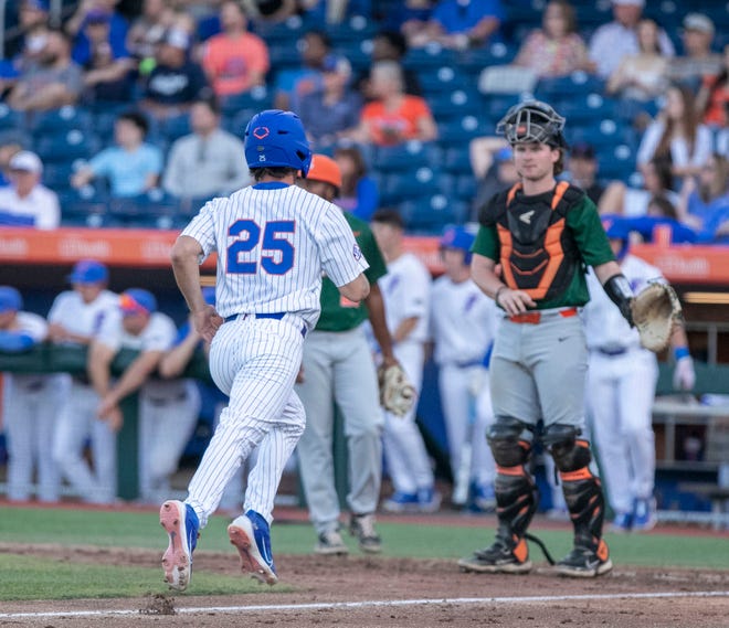 Florida's outfielder Richie Schiekofer (25)scores a run in the bottom of the third inning against Florida A&M. Florida beat FAMU17-7 in 7 innings of play, Tuesday, April 18, 2023, at Condron Family Baseball Park in Gainesville, Florida.[Cyndi Chambers/ Gainesville Sun] 2023