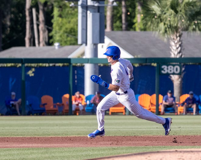 Florida's outfielder Michael Robertson (11) heads for third in the bottom of the first inning against Florida A&M. Florida beat FAMU17-7 in 7 innings of play, Tuesday, April 18, 2023, at Condron Family Baseball Park in Gainesville, Florida.[Cyndi Chambers/ Gainesville Sun] 2023
